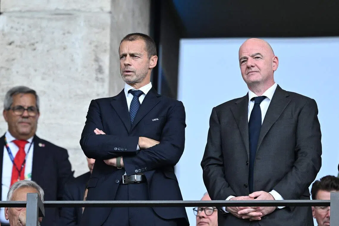UEFA President Aleksander Ceferin (left) and FIFA President Gianni Infantino attending a UEFA Euro match in Berlin on June 29, 2024.