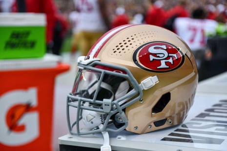 a gold San Francisco 49ers football helmet