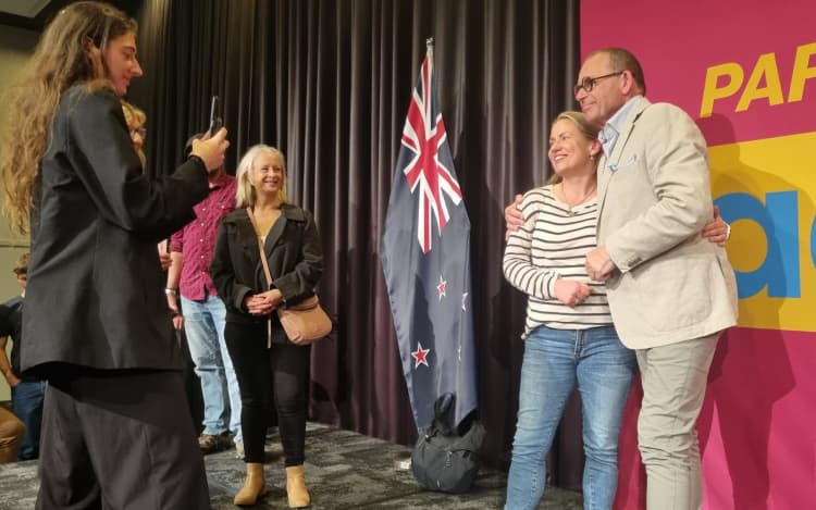 Paul Henry with a fan.