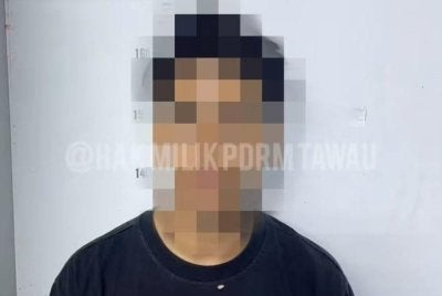Suspek ditahan selepas dipercayai merogol jirannya di sebuah kampung di Tawau. Foto IPD Tawau