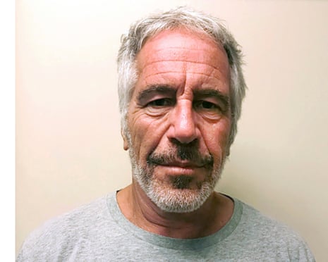 Grizzled man in gray T-shirt in mugshot.