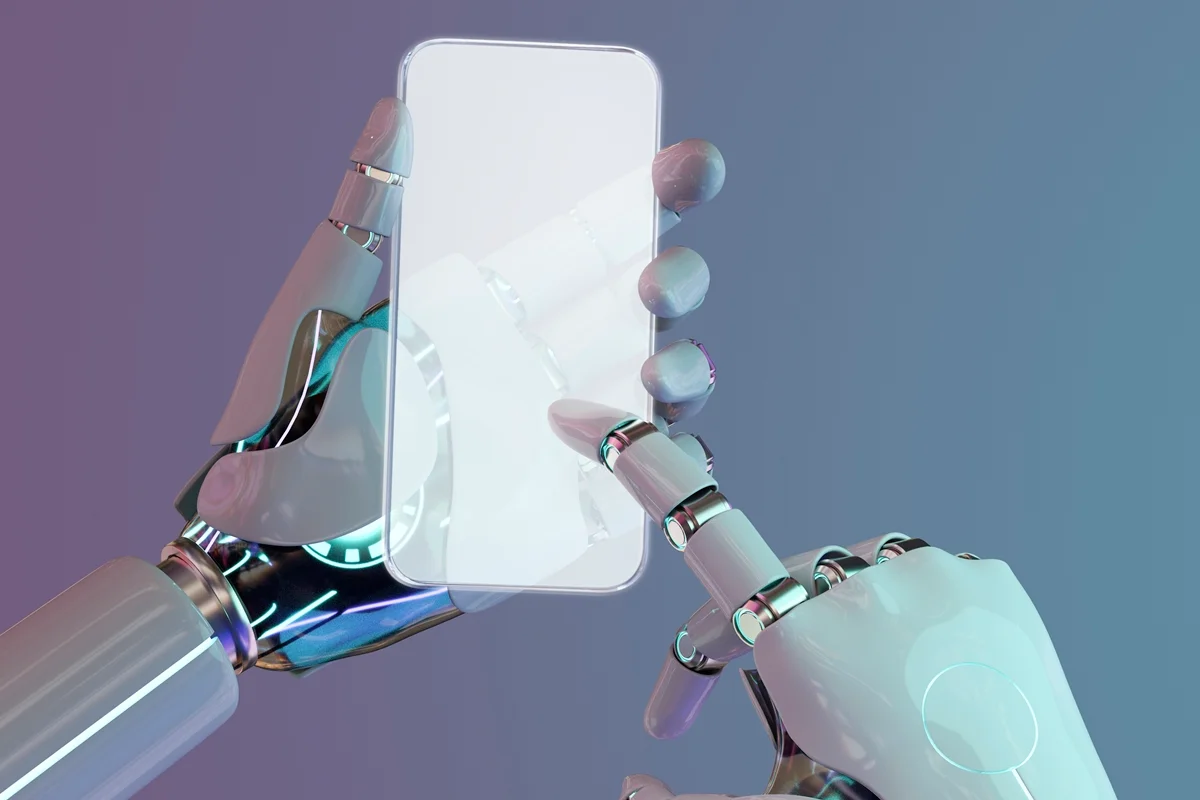 Ilustração colorida de robô utilizando um aparelho celular - Metrópoles.