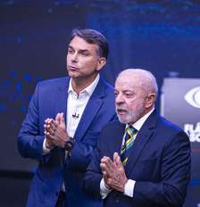 Lula e Flávio Bolsonaro durante debate da Band Foto: BRUNO MOTTA/ENQUADRAR / Estadão